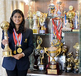 P. V. Nandhidhaa with her Chess tournament trophies