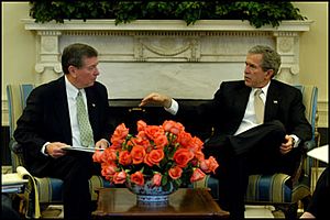 President George W. Bush meets with Attorney General John Ashcroft in 2003