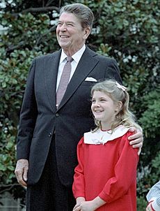 President Reagan with Drew Barrymore at a ceremony launching the Young Astronauts program on the south lawn. October 17, 1984