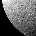 Impact craters on the surface of Rhea appear similar to Earth's Moon