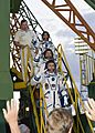 Soyuz TMA-05M crew members wave farewell