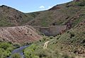 2013-06-16 13 59 05 Wild Horse Dam in Nevada viewed from down the Owyhee River, with Nevada State Route 225 on the left