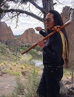 Charles Littleleaf with his Native American flute.jpg