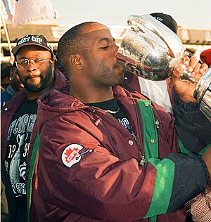Mike Pringle drinks from Canadian football league GREY CUP