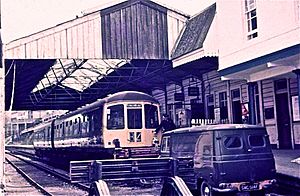 Rear oil lamp being placed on a Class 103 at Kingswear station (1972)