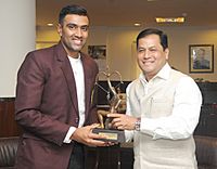 The Minister of State for Youth Affairs and Sports (Independent Charge), Shri Sarbananda Sonowal conferring the Arjuna Award on cricketer Ravichandran Ashwin, in New Delhi on July 31, 2015