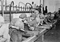 Women workers in ordnance shops, Midvale Steel and Ordnance Company, Nicetown, Pennsylvania. Hand chipping with pneumati - NARA - 530774
