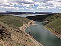 2013-06-16 13 22 55 Wild Horse Reservoir in Nevada viewed from a rock outcrop above dam, with Nevada State Route 225 along the shore