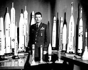Bernard Schriever with models of his missiles