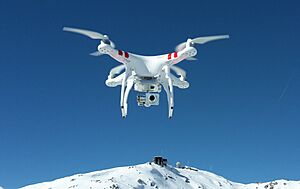 DJI Phantom 2 Vision+ V3 hovering over Weissfluhjoch (cropped)