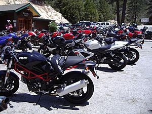 Ducati Monster, GSX-R and other motorcycles in lot at Newcomb's Ranch.jpg