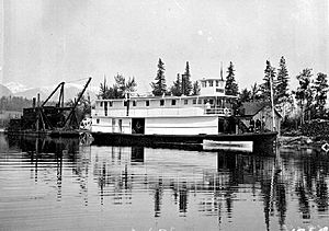 Duchess (sternwheeler) on Columbia River BC with Mudlark (clamshell dredge) 1898