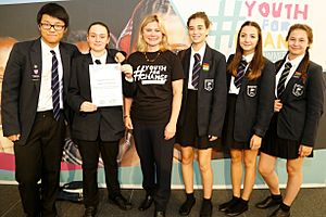 Pupils from Raynes Park High School in south-west London receive a -ShapetheFuture competition runners-up certificate from Justine Greening (14503685759)
