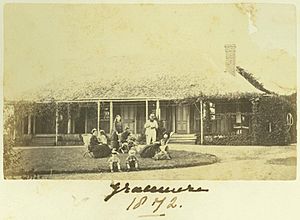 StateLibQld 1 235762 Archer family having tea on the lawn at Gracemere