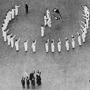 Bellamy salutes detail in 1917, from- Saluting the Flag NGM-v31-p361 (cropped)