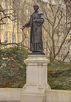 Emmeline Pankhurst statue on podium Victoria Tower Gardens