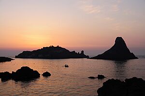 Islands of the Cyclops at Dawn Sicily Italy - Creative Commons by gnuckx (5040746982)