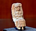 Mesopotamian female deity seating on a chair, Old-Babylonian fired clay plaque from Ur, Iraq
