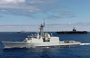 US Navy 040625-N-9769P-082 The Canadian destroyer HMCS Algonquin (DDG 283) is shown underway in close formation with the Nimitz-class aircraft carrier USS John C. Stennis (CVN 74) and the guided missile frigate USS Ford (FFG 54)