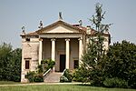A villa with columns in front