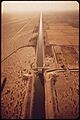 ALL-AMERICAN CANAL FEEDING THIRSTY IMPERIAL VALLEY WITH WATER FROM THE COLORADO RIVER. MEXICO ON LEFT - NARA - 548896