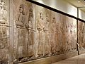 A procession of high-ranking Assyrian officials followed by tribute bearers from Urartu. From Khorsabad, Iraq. Iraq Museum