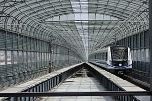 Train leaving Xujiacao Changle Station, 2014-07-06