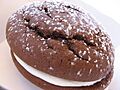 Whoopie pie with dusting of confectioner's sugar