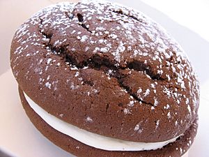 Whoopie pie with dusting of confectioner's sugar