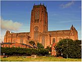Church of England Cathedral, a large red-brick up-sized down capital letter 'T' shaped building.