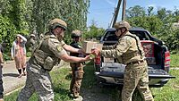 Nebraska State Sen. Tom Brewer delivering humanitarian aid in Ukraine