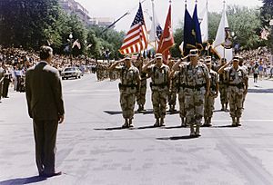President Bush greets General H. Norman Schwarzkopf who leads the Desert Storm Homecoming Parade in Washington, D.C - NARA - 186434