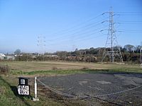 Pylons and rugby pitch by Cambuslang Road - geograph.org.uk - 1230015