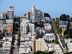 Aerial photo of hill in San Francisco, with many multistory buildings