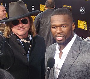 Val Kilmer and 50 Cent (cropped)