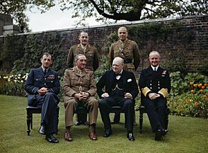 Winston Churchill with his Chiefs of Staff in the garden of 10 Downing Street, 7 May 1945. Seated, left to right- Air Chief Marshal Sir Charles Portal; Field Marshal Sir Alan Brooke; Winston Churchill; Admiral Sir Andre TR2842