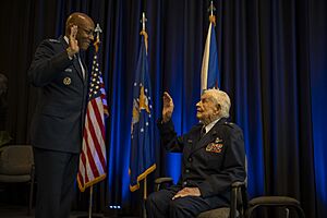 Air Force Chief of Staff Gen. CQ. Brown, Jr. administers the reaffirmation of the oath of office to retired Brig. Gen. Clarence E. “Bud” Anderson, during a ceremony promoting Anderson to the rank of brigadier general (2022)