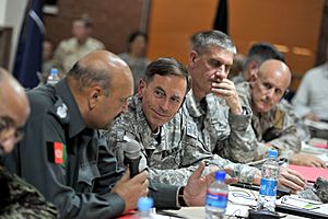 Defense.gov News Photo 100707-F-7552L-006 - Commander of the International Security Assistance Force Gen. David H. Petraeus 3rd from left U.S. Army speaks with Afghan Minister of Security.jpg