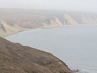 Fog hanging over the white cliffs and water at Drakes Bay, Point Reyes California.jpg