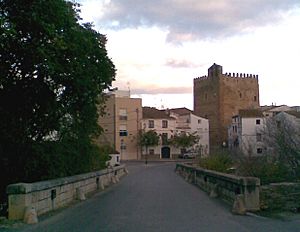 Southern entrance of the village with the 14th century tower in the background