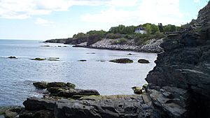 Newport shoreline of Easton Bay looking south from cliffside overlook at east end of Narragansett Ave