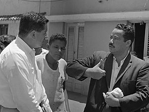 Ruben Salazar interviews civilians in Vietnam, 1965