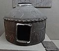 Vaulted cinerary urn engraved with deer designs