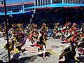 A Diablada dance squad passing through the streets of Oruro.