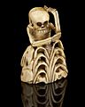 Ivory netsuke, in the form of a skeleton 2