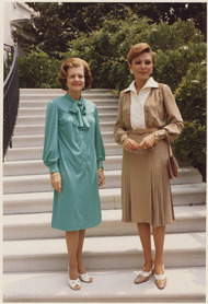 Photograph of First Lady Betty Ford with the Shahbanou (Empress) of Iran on the Steps Leading to the Truman Balcony... - NARA - 186813