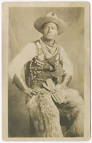 Photographic postcard portrait of an early 20th century cowboy