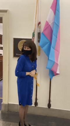 Rep. Marie Newman with transgender pride flag