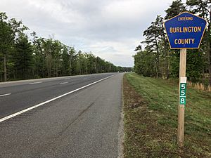 2018-05-22 07 03 06 View south along New Jersey State Route 444 (Garden State Parkway) entering Bass River Township, Burlington County from Little Egg Harbor Township, Ocean County in New Jersey