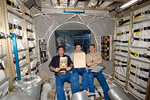 Crew in ATV with Jules Verne manuscript